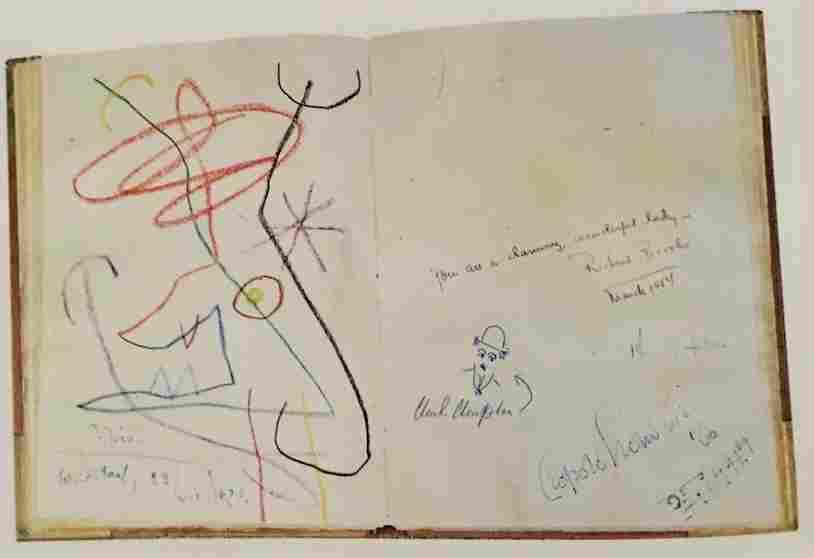 page with Chaplin and Miro's guestbook signature from the book La Colombe d'Or by Prosper Assouline